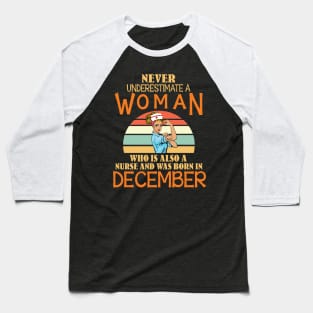 Never Underestimate A Woman Is A Nurse Was Born In December Baseball T-Shirt